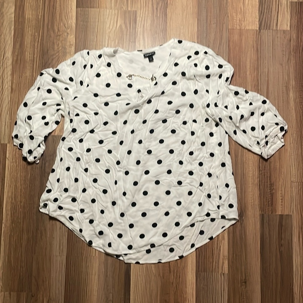 White blouse with black polka dots